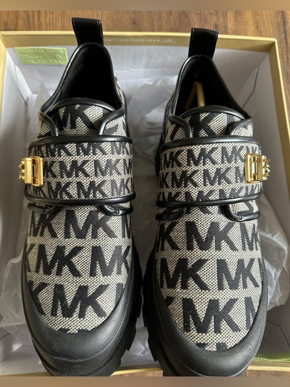 Michael Kors Padma Loafers with golden buckles